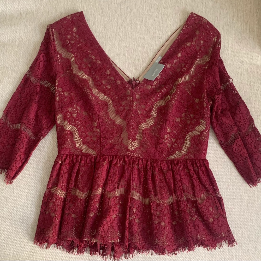 Anthropologie red lace peplum top